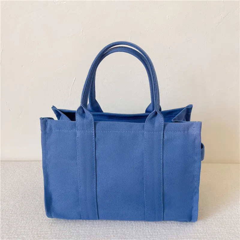 The London Tote – Classic Canvas - Urban style with personality. Spacious, lightweight, and perfect for busy routines.
