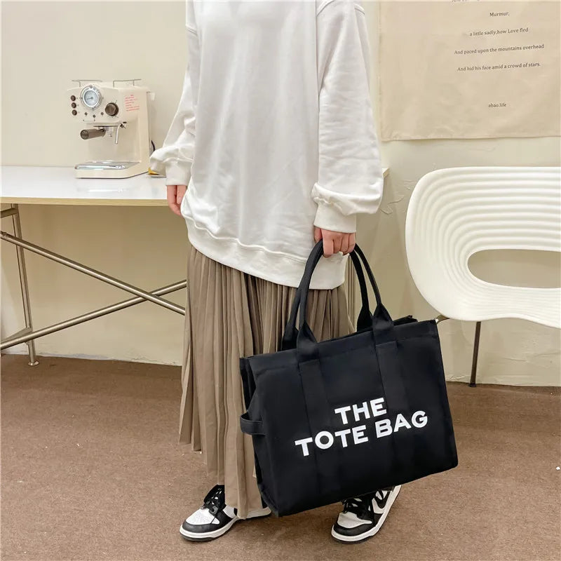 The London Tote – Classic Canvas - Urban style with personality. Spacious, lightweight, and perfect for busy routines.