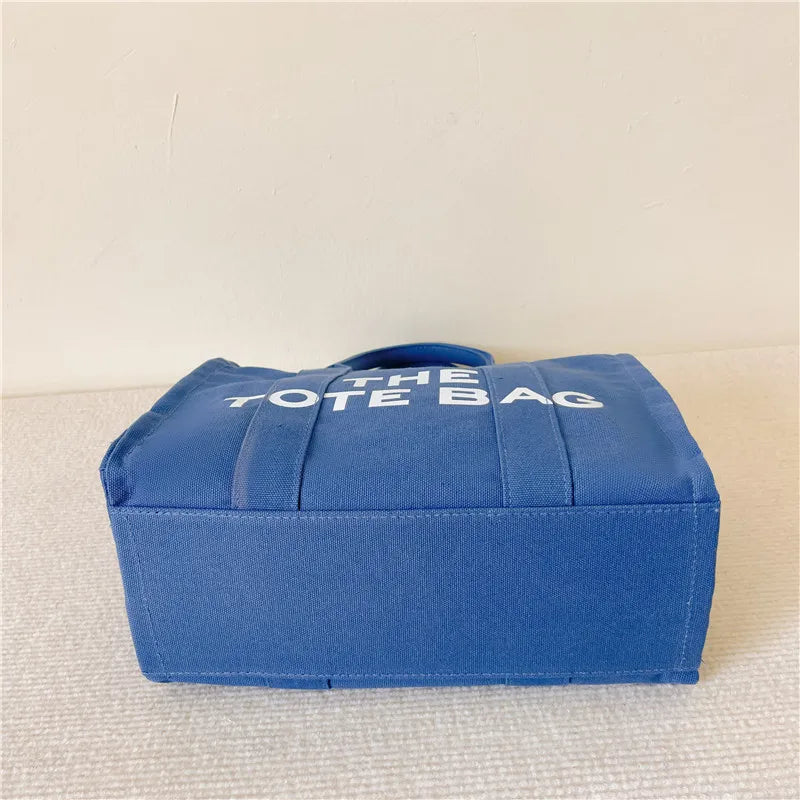 The London Tote – Classic Canvas - Urban style with personality. Spacious, lightweight, and perfect for busy routines.