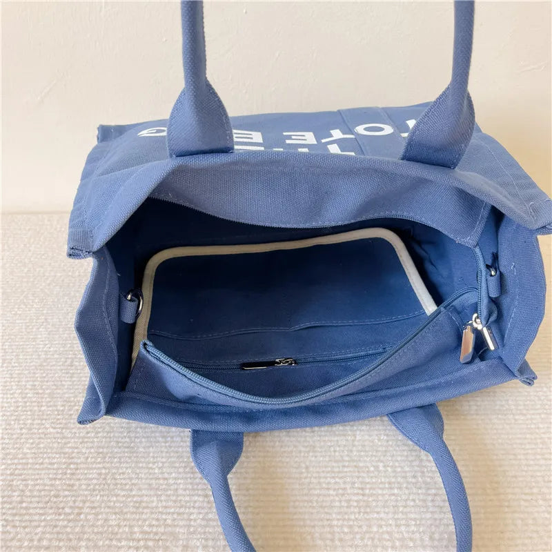 The London Tote – Classic Canvas - Urban style with personality. Spacious, lightweight, and perfect for busy routines.