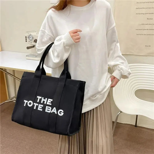 The London Tote – Classic Canvas - Urban style with personality. Spacious, lightweight, and perfect for busy routines.